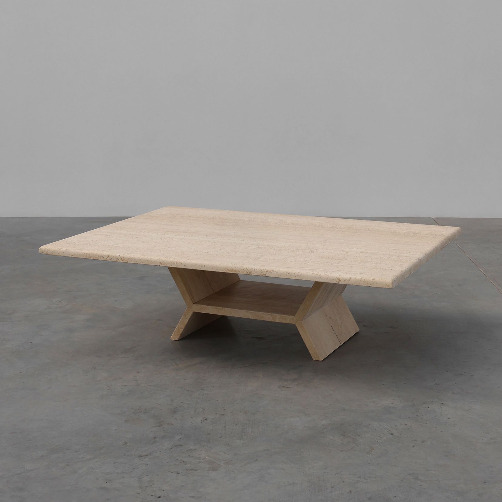 Sculptural geometric rectangular travertine coffee table, Italy 1960s-img